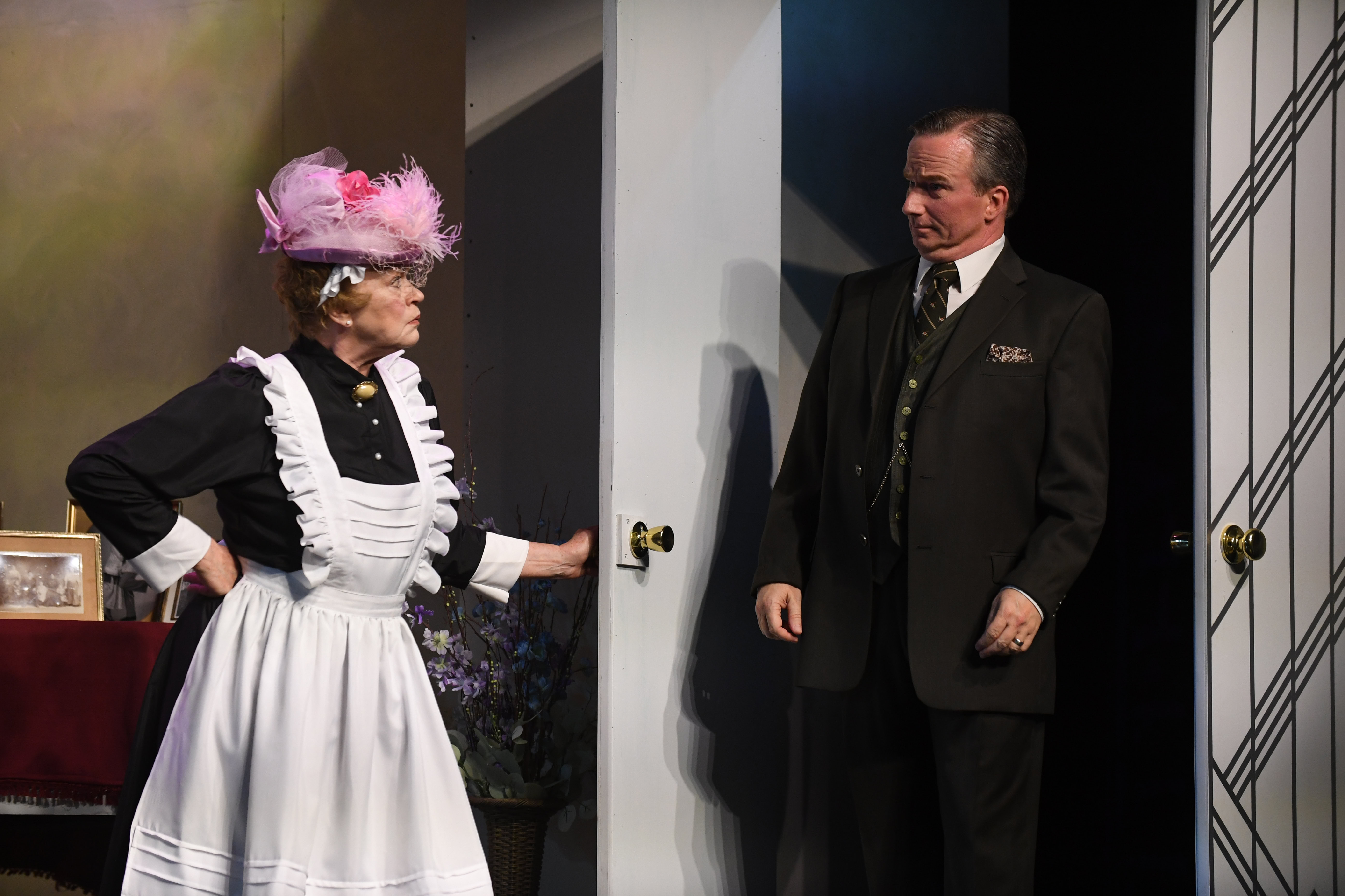 actress singing in front of a shed